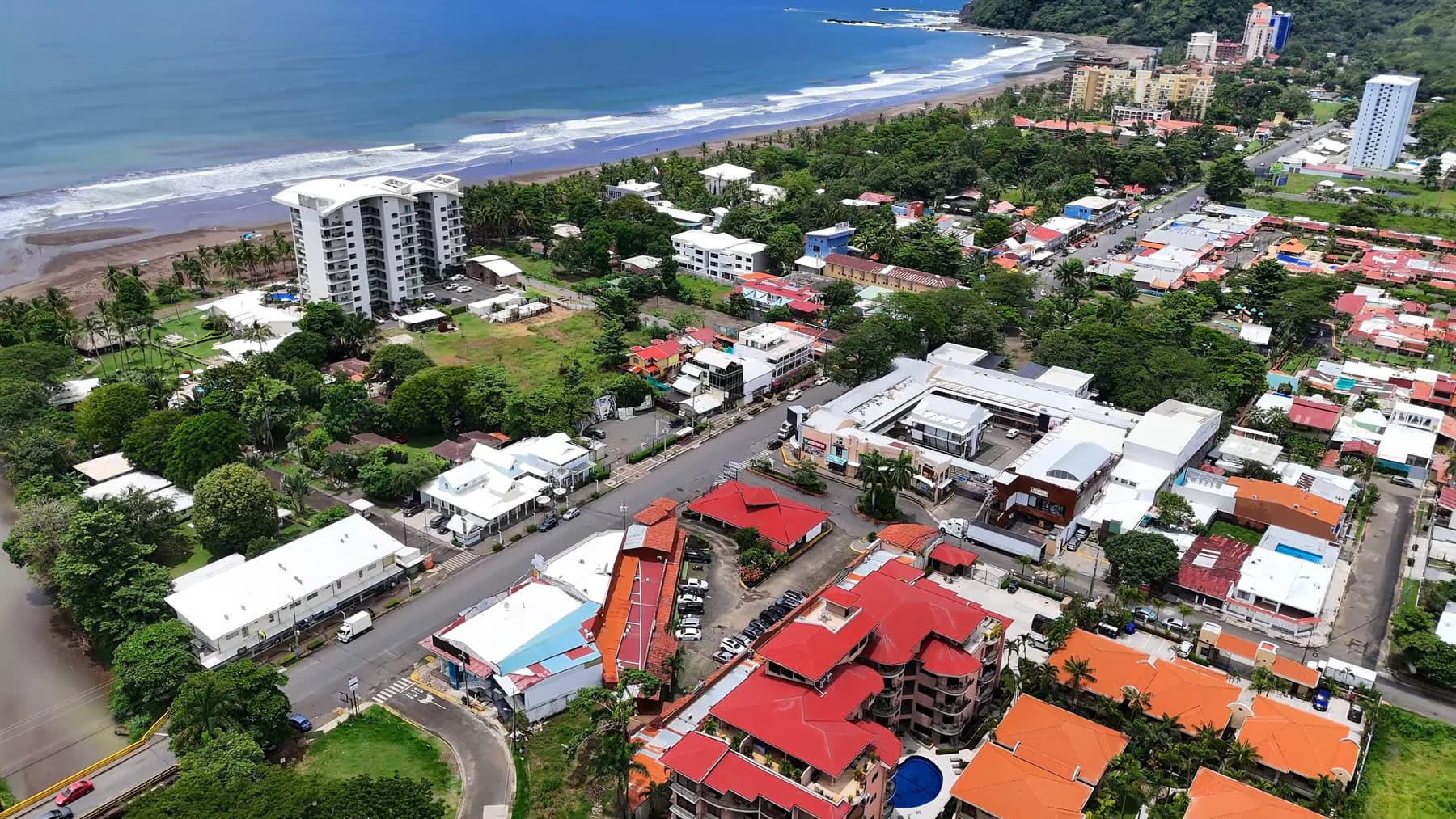 Aerial view of Jacó: the town, the main street and the beach